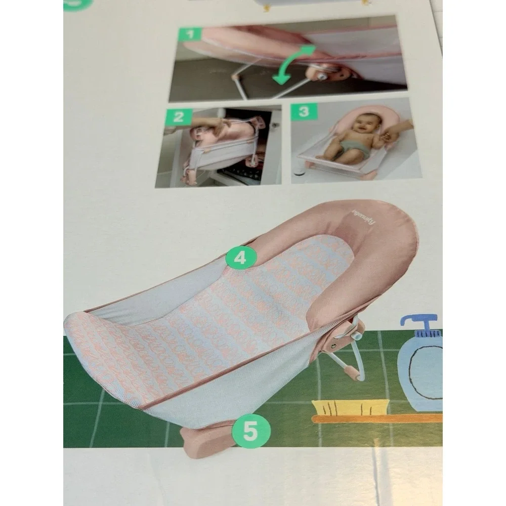 New in box foldaway 2 position bather. Pink.  For 0-6 months.